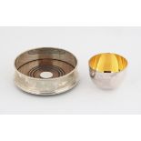 Modern silver coaster with wood base and a modern silver tumbler cup SILVER COLLECTION OF SIR