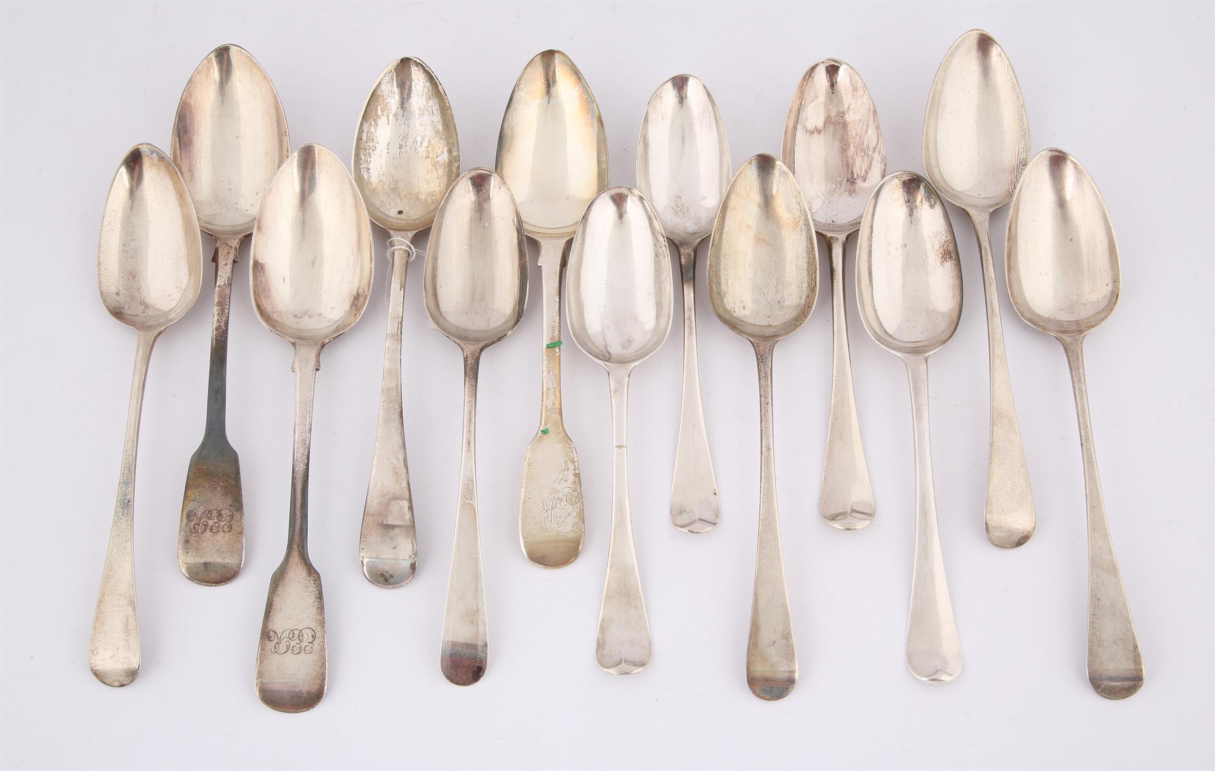 Thirteen various George III silver table spoons, 24.1 ozs 762 grams SILVER COLLECTION OF SIR RAY