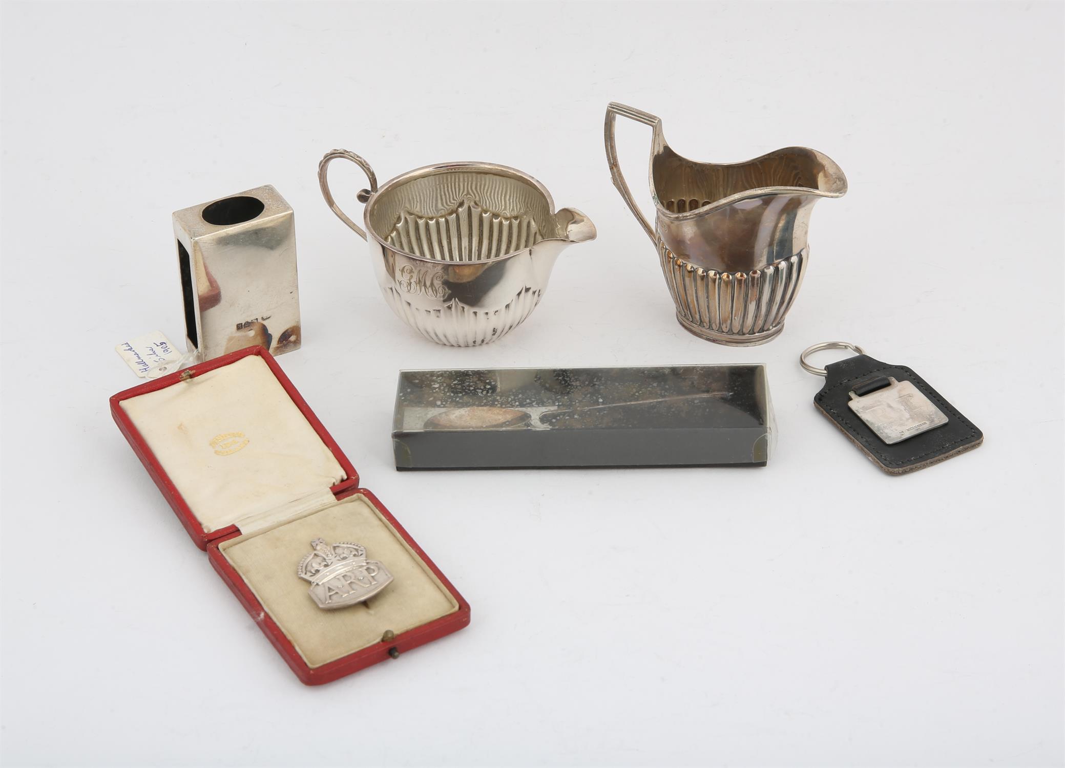 Various small silver and silver plated items, comprising a silver ARP badge, reproduction Roman