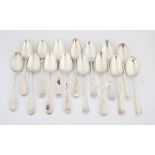 Fifteen eighteenth century silver Old English Pattern table spoons, some pairs and various dates,