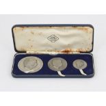 1969 Britannia silver Prince of Wales Investiture three-piece coin set by John Pinches of London,