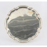 Silver presentation salver on scroll feet, engraved "Ray Tindle CBE, Chairman Surrey Advertiser,