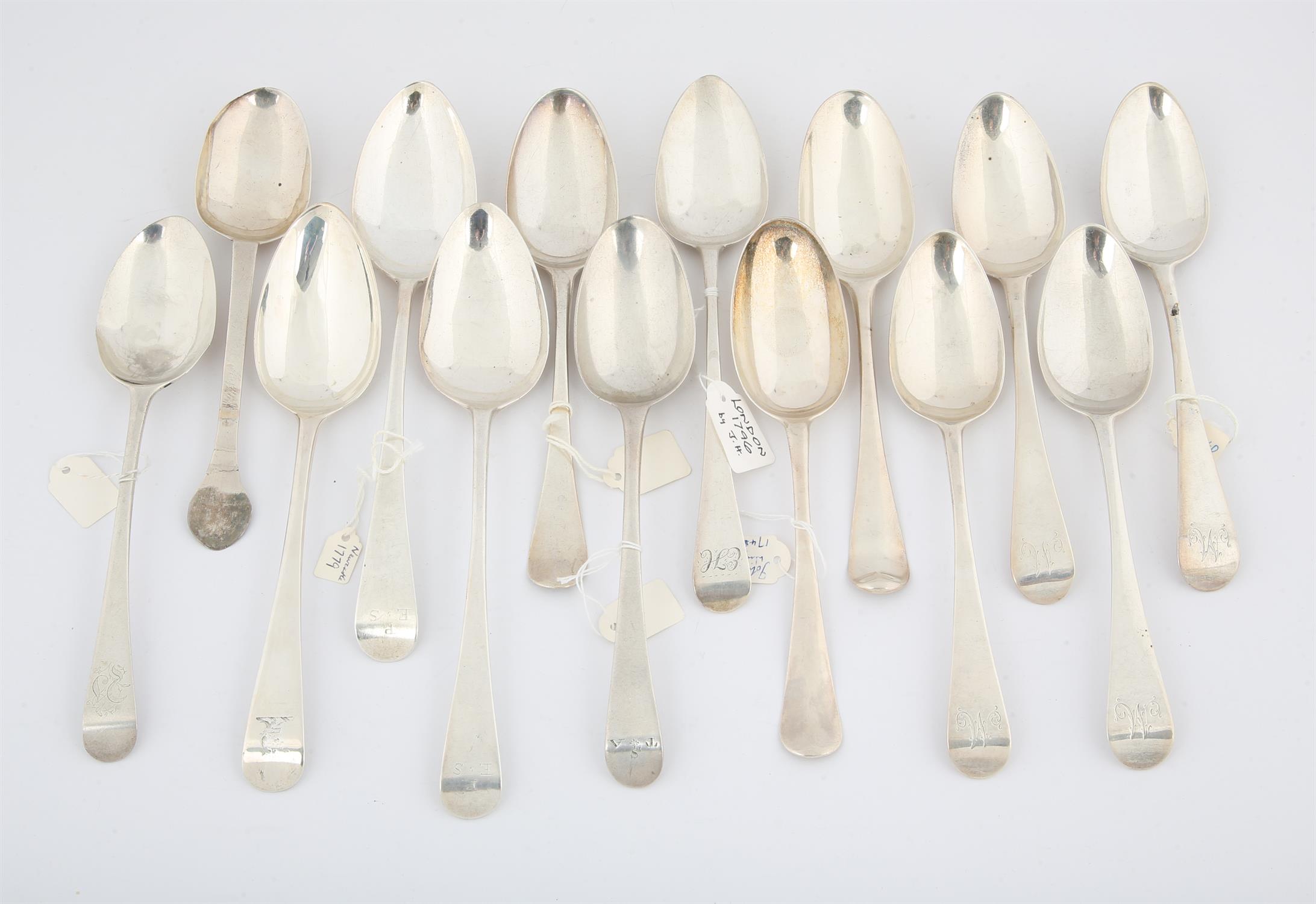 Fourteen various 18th century 18th century silver table spoons, 25.8 ozs 802 grams SILVER