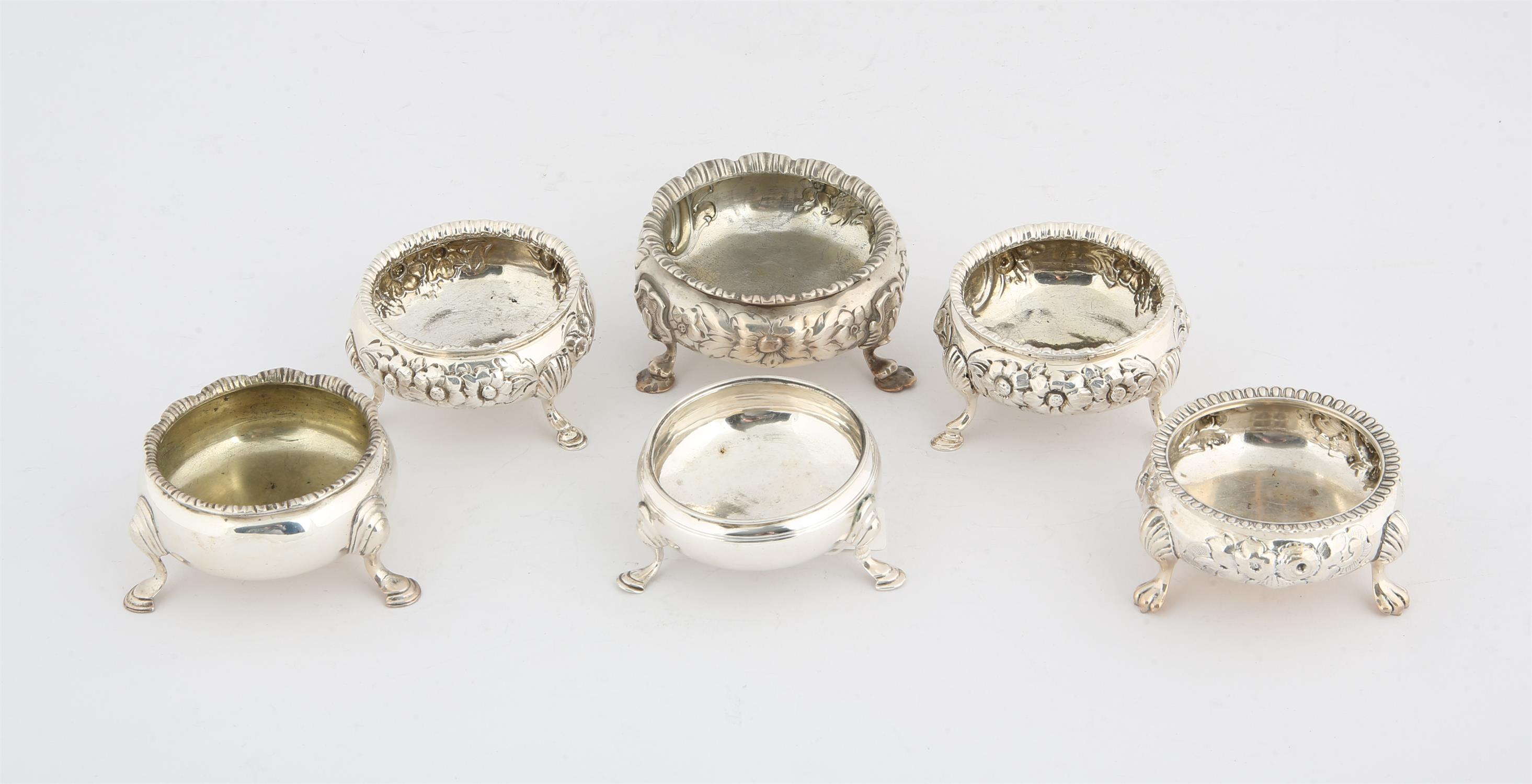 Pair of 19th Century embossed silver round salts and four other round open salts, 11.