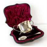 Two handled Victorian trifid end two handled cup and spoon London 1892/3, in case, 5.