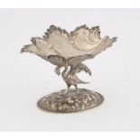 Continental silver sweet meat dish, late 19th Century, in the form of a bird supporting a leaf form,