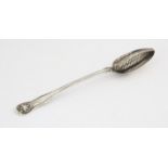 George III silver Old English shell and reeded pattern straining gravy spoon, by William Eley and