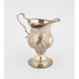 George III silver cream jug embossed with houses and a cow London 1779, 2.3 ozs 72 grams SILVER