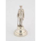 WWI Cast Silver Regimental figure of a soldier in Battle Dress inscribed "to an old soldier who