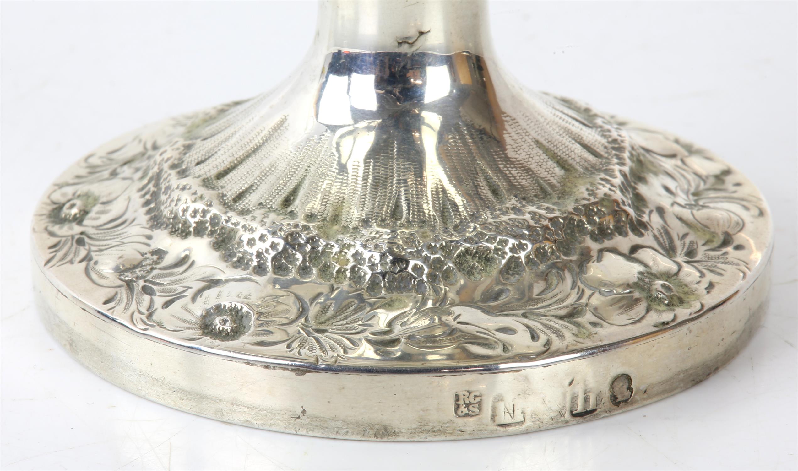 George IV silver two handled cup with shaped handles and embossed decoration, 67 cms high, 14. - Image 2 of 2