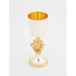 An Aurum silver and silver-gilt College of Arms goblet, the plain bowl above stem with three