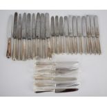 Box containing approx twenty five silver handled knives SILVER COLLECTION OF SIR RAY TINDLE