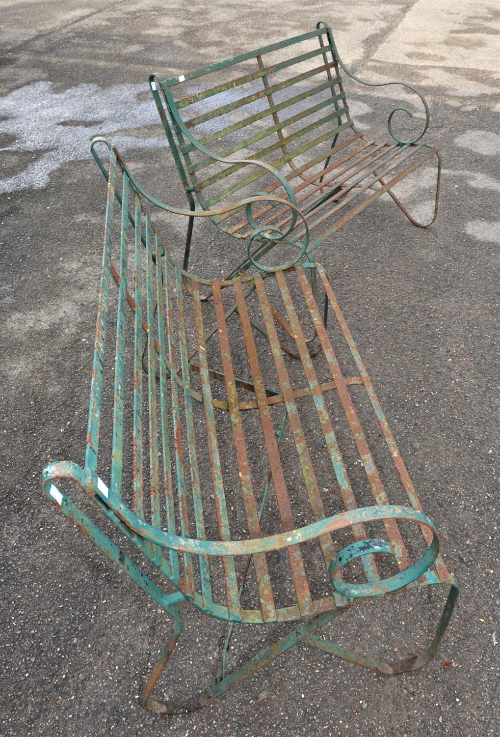 Two wrought iron green painted garden benches, scrolling arms and legs with slatted seats, - Image 3 of 3