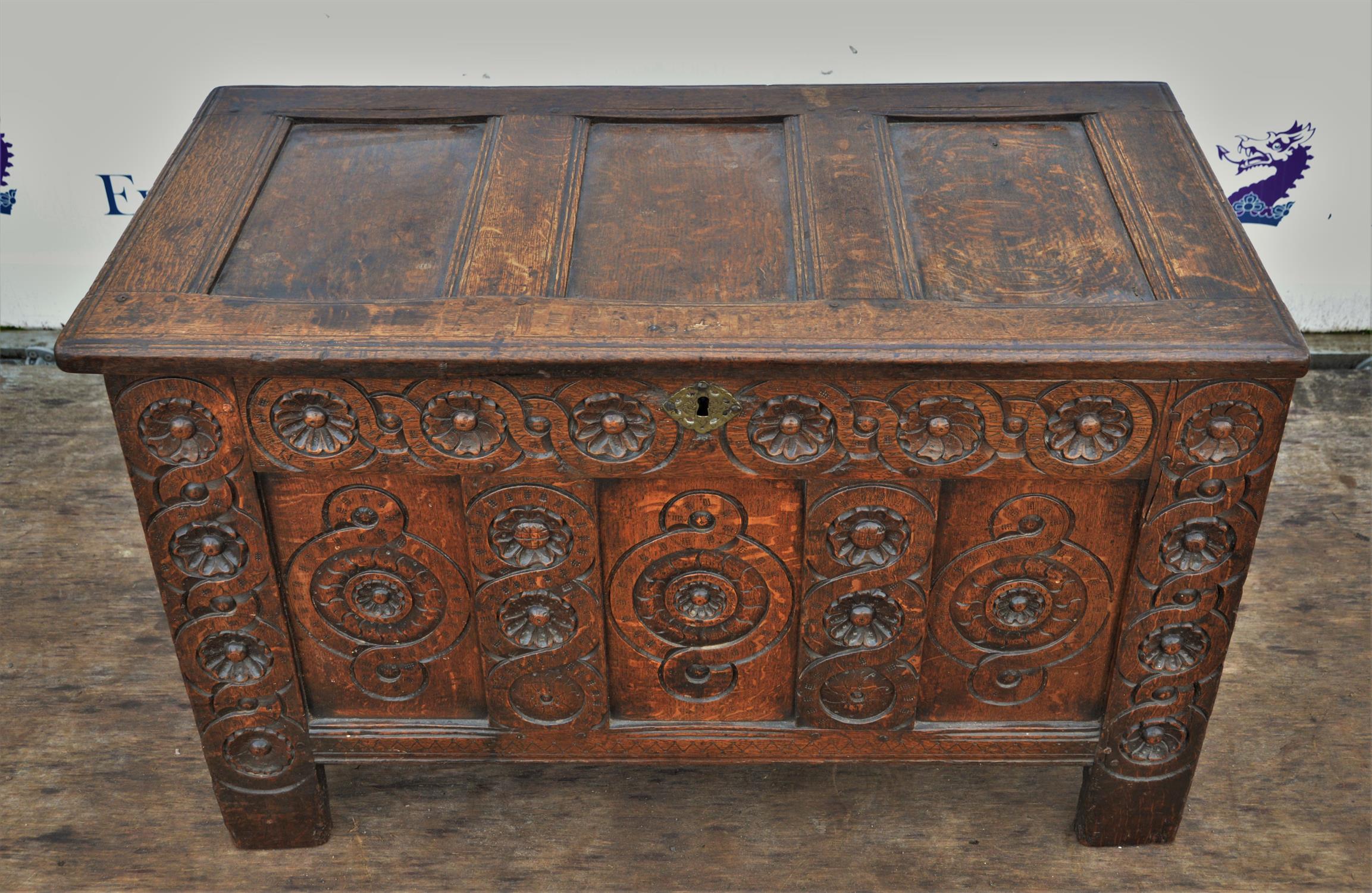 Oak chest, late 17th/early 18th Century, possibly later carved to the facade with geometric designs, - Image 2 of 5