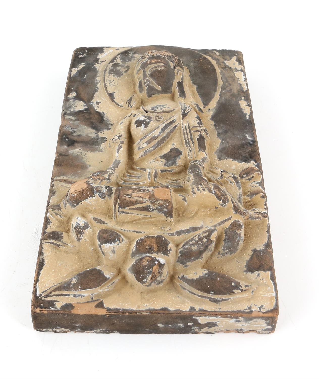 An unglazed terracotta tile with traces of polychrome decoration of a Guanyin, possibly Tang - Image 6 of 7