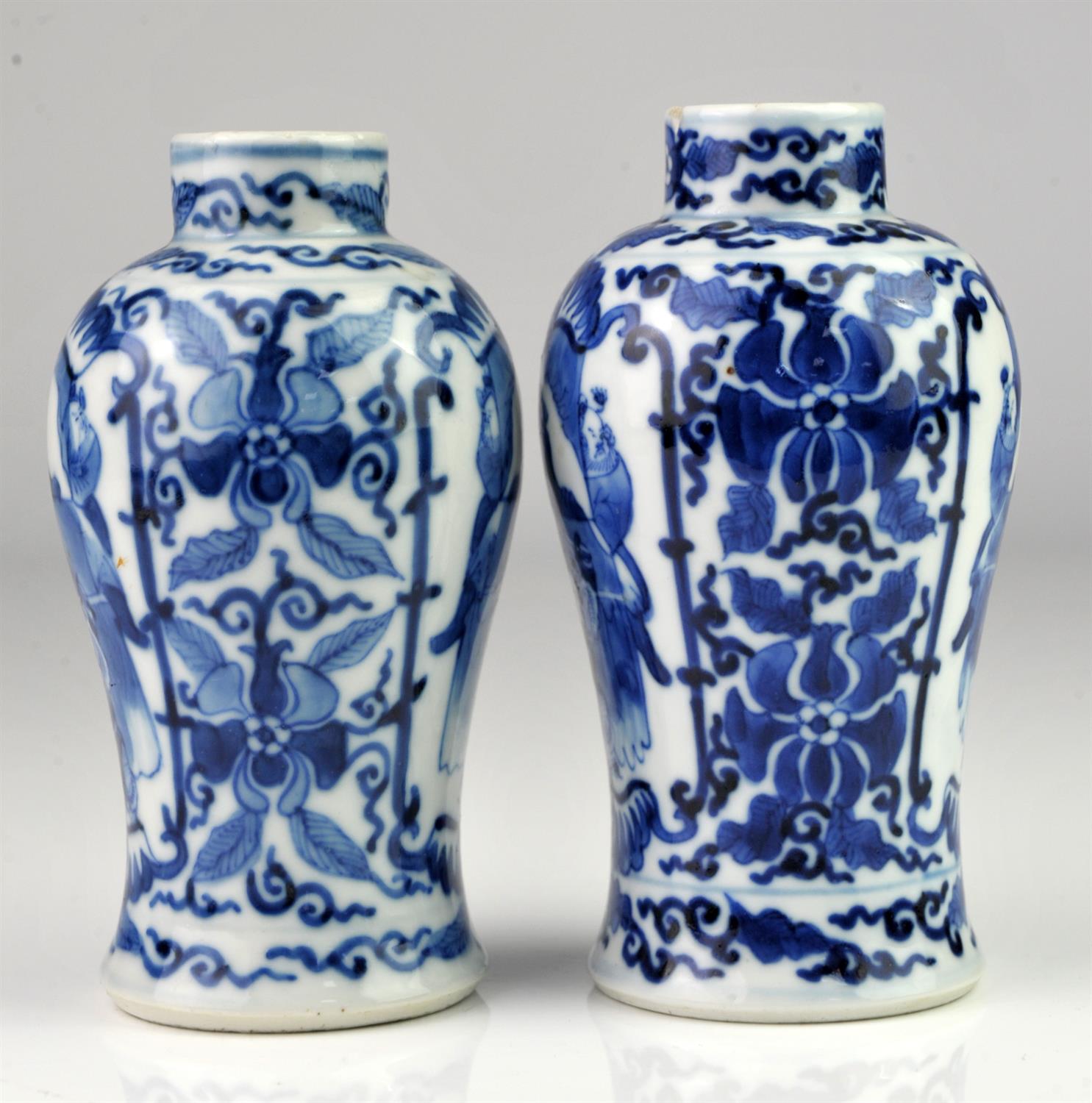 Matched pair of Chinese blue and white vases decorated with two panels of figures framed by - Image 2 of 5