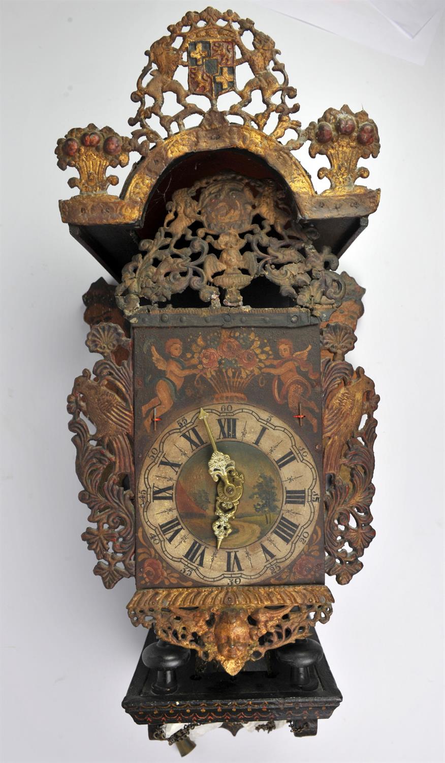 A Dutch Freise Stoel clock, late 19th/early 20th Century, with pierced armorial cresting,,