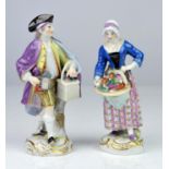 Pair of Meissen porcelain figures, late 19th/early 20th Century, modelled as a man wearing a purple