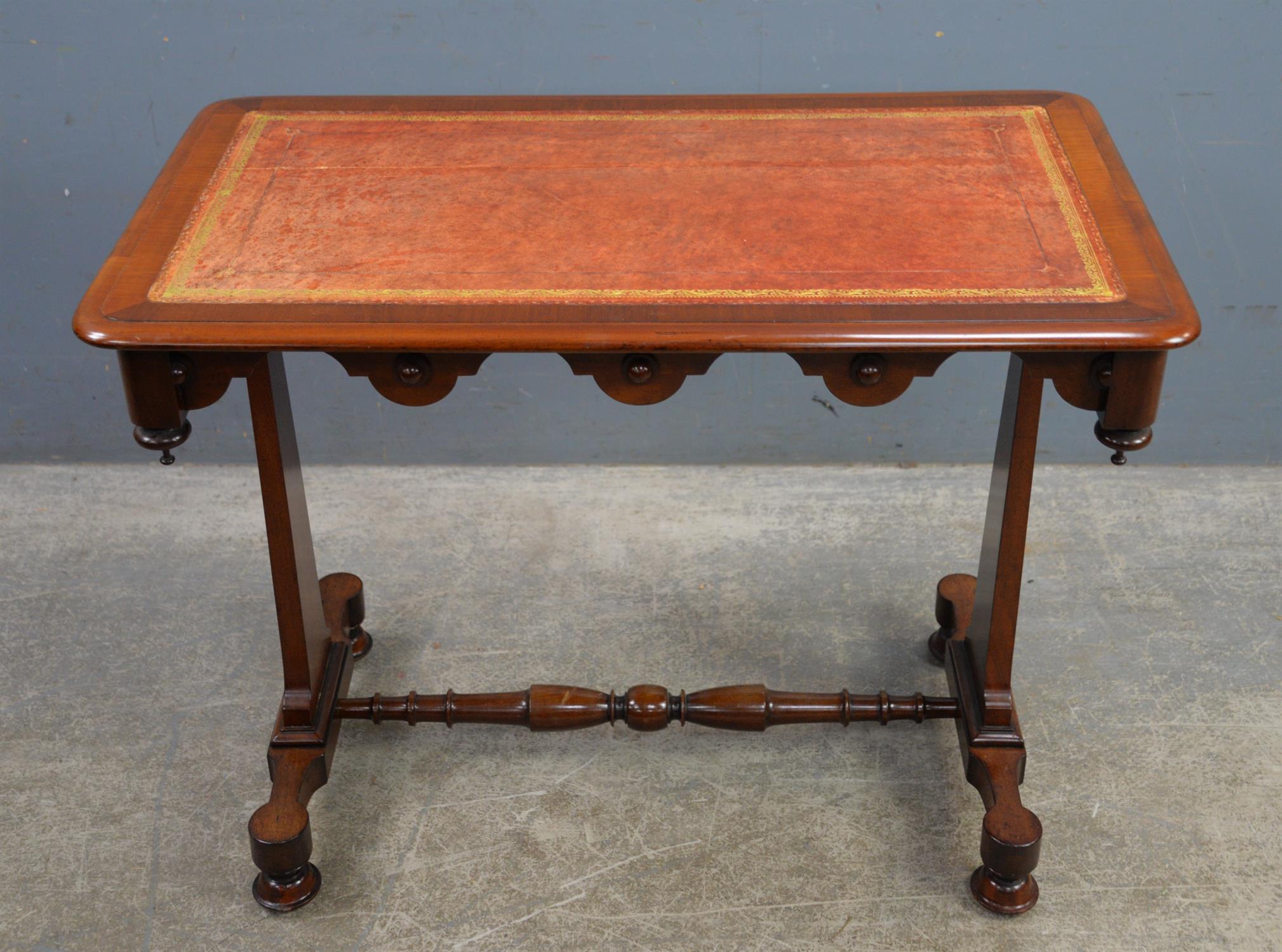 Victorian mahogany table, with red leather inset top, with pendant turned knobs, on end supports,