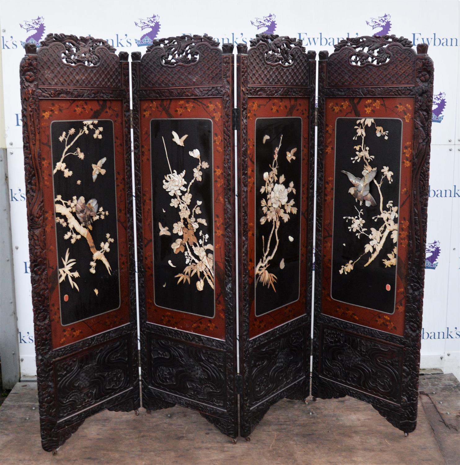 Chinese lacquer and bone and mother of pearl four fold screen, late 19th/early 20th Century,
