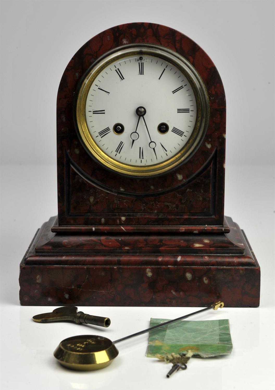 French rouge griotte marble mantel clock, late 19th Century, of arched form, on stepped moulded
