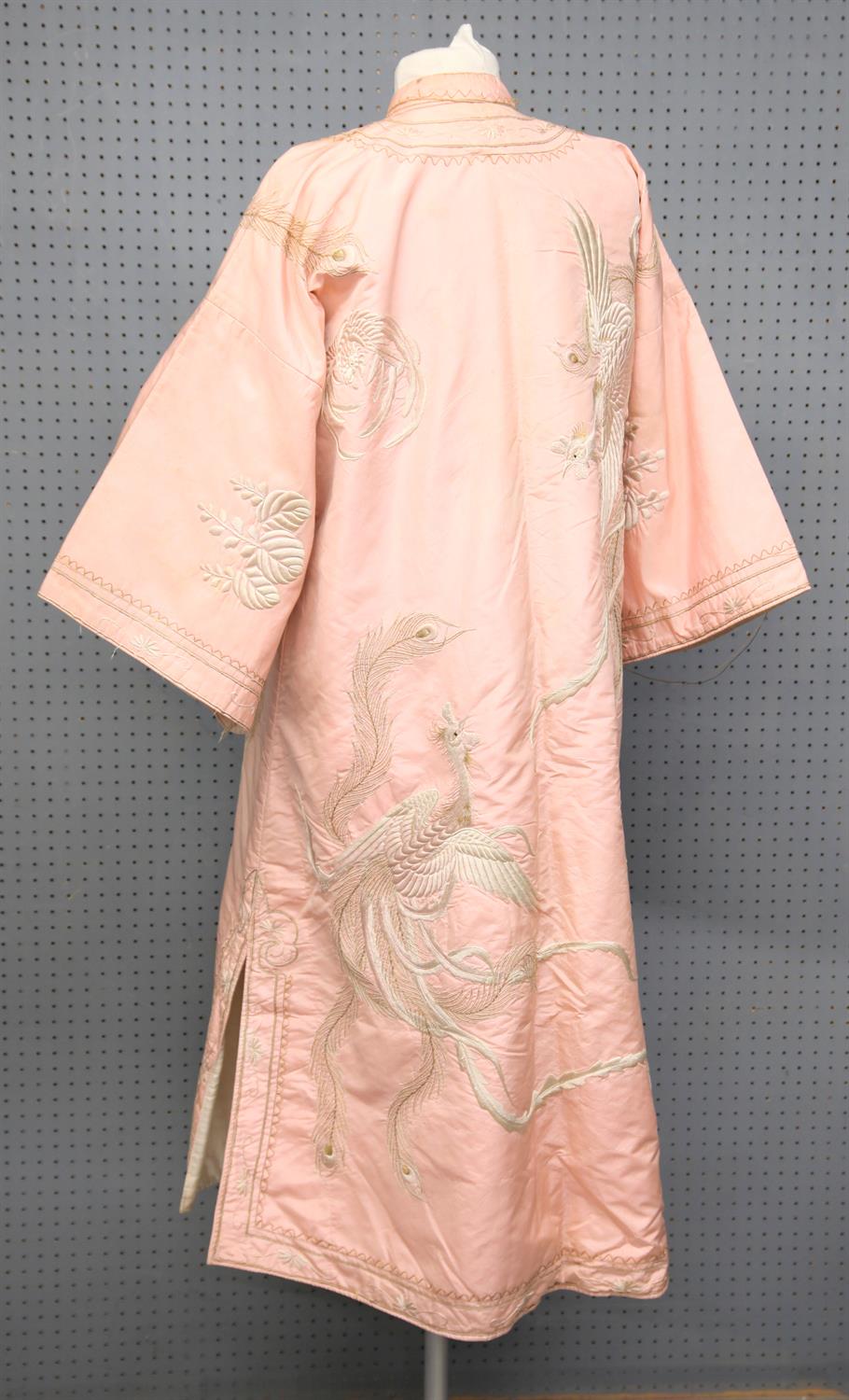 A Chinese pink robe embroidered with a peacock, Republic period. 125 cm long - Image 2 of 2