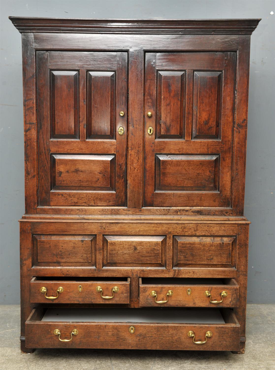 Oak cupboard, 19th Century, with two panelled doors, above two short and one long drawer, - Image 2 of 3