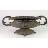 Early 20th century grey painted cast-iron planter, with scroll handles, moulded floral decoration