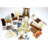 Dolls house furniture and fittings to include a part dinner service, cots, table, chair, mangle,