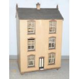 Late Victorian painted pine dolls house, the front with six sash windows, the back with two doors