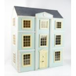 Modern Georgian style dolls house, the swing front opening to reveal nine rooms on three floors,