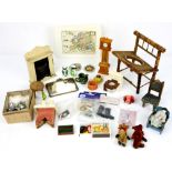 Dolls house furniture and fittings to include a miniature longcase clock, four matching fire places,