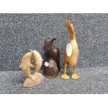 Exotic heavy hardwood figurine of a eagle together with a wooden dolphin ornament plus wooden dcuk