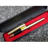 Gold coloured cased parker fountain pen with 18ct gold nib