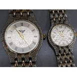 His & hers matching wristwatches in the style of Georgio Armani, both in working condition