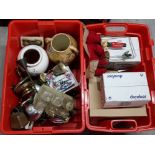 2 red storage boxes containing miscellaneous items including cruet set, drinking glasses, vases etc