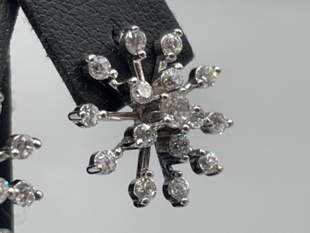 Silver and CZ snowflake stud earrings. - Image 2 of 2