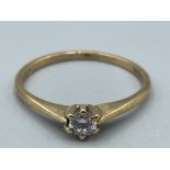 Ladies 9ct gold CZ solitaire ring. Size N 1.3g