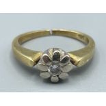 Ladies 9ct white and yellow gold diamond flower ring. Size J 4.1g