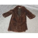 A ladies 3/4 length brown fur coat by Eric's Southampton