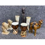 Collectors lot comprising of a pair of genuine leather camels, pair of african drums, 2x horns & 2