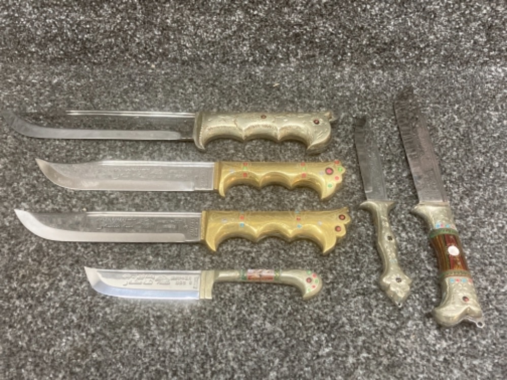 Six oriental decorative daggers with ornate grips