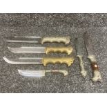 Six oriental decorative daggers with ornate grips