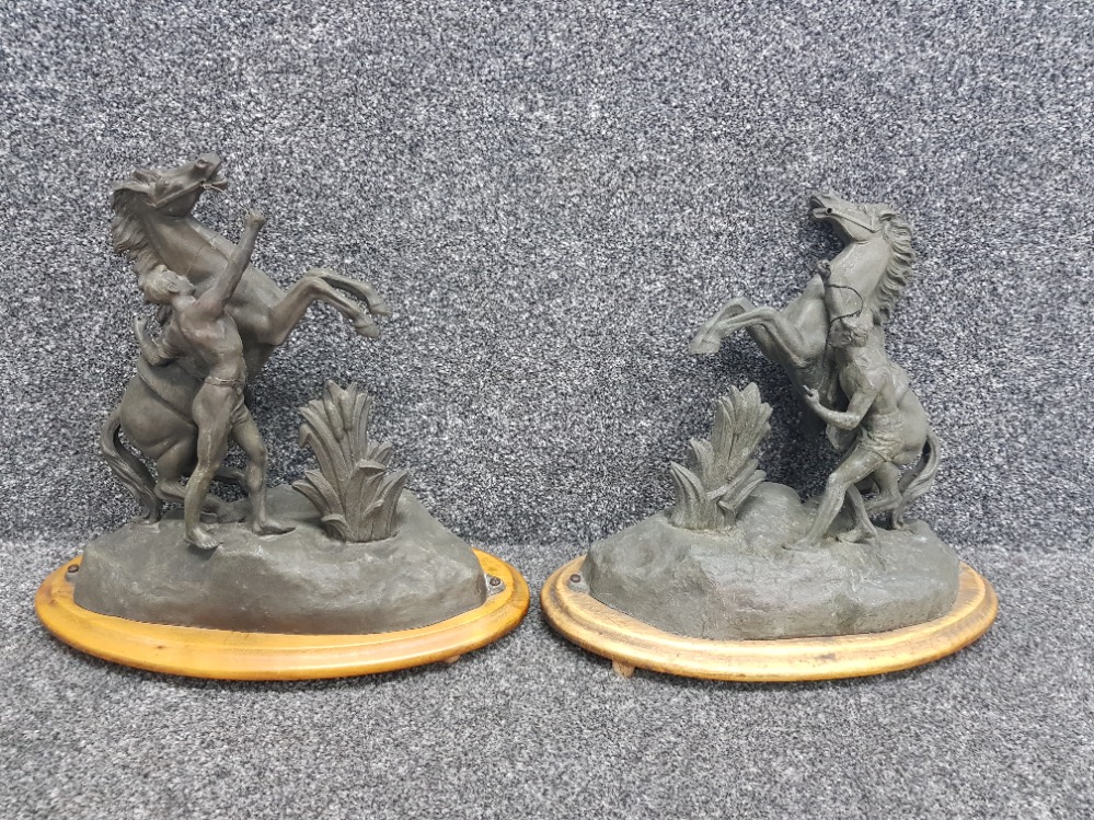Vintage or earlier pair of spelter rearing horses on ply