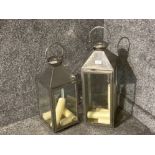 Two metal and glass lanterns tallest 70cm high including handle