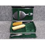 Boxed vintage 4 piece dressing table set includes hairbrush, mirror, glove stretchers and one