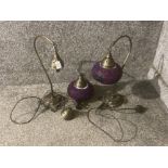A pair of Middle Eastern style lamps with spare parts