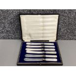 6 piece knife set with mother of Pearl handles & hallmarked Sheffield silver band dated 1923, with