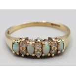 Ladies 9ct yellow gold opal and cz band 1.8g gross size S