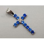Brand new ex display 14ct white gold & blue stone cross pendant, 1.3g gross